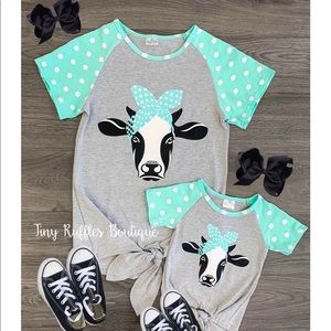 Women’s mint polka dot cow tie front tee